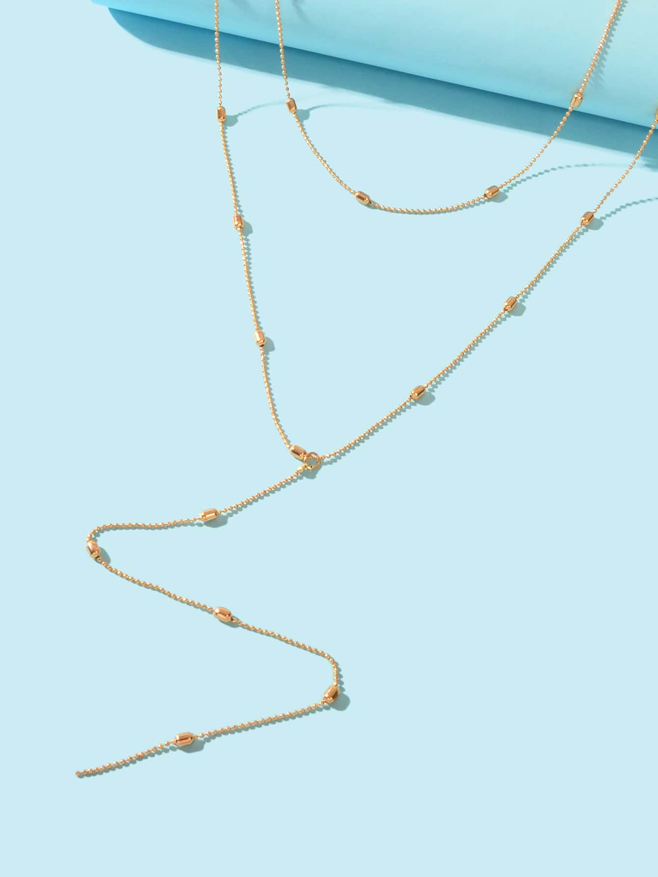 Double-Layered Beaded Wave Chain Tassel Necklace Elegant Statement Piece