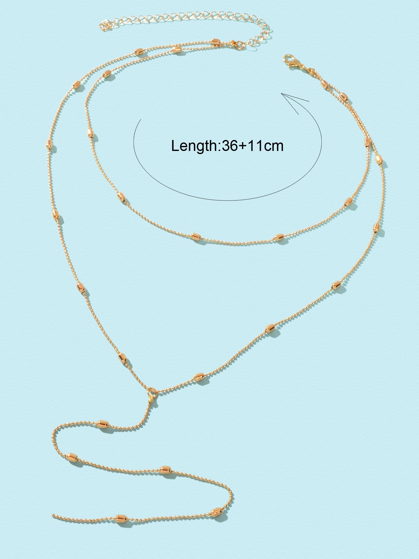 Double-Layered Beaded Wave Chain Tassel Necklace Elegant Statement Piece